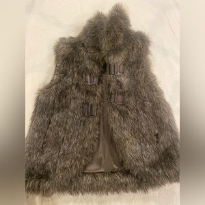Faux fur vest with front clips